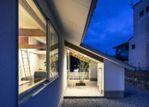 Irregular-plot-gives-birth-to-unique-modern-home-in-Japan-with-warm-lighting-217x155
