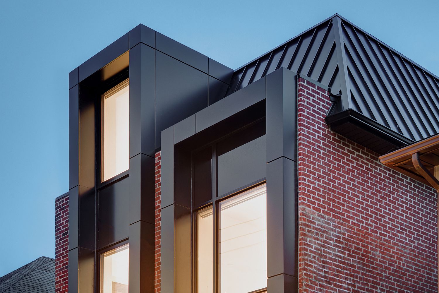 Metal, glass and brick shape the exterior of this Toronto home