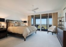 Transitional-bedroom-with-bedding-and-drapes-in-beige-217x155