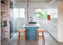 White-kitchen-with-a-light-blue-island-and-plenty-of-natural-light-217x155