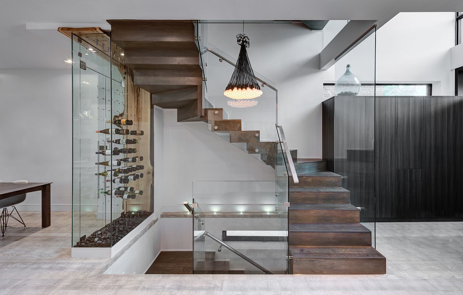 Wine storage and display area next to the staircase