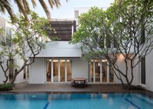 Wooden-deck-and-shared-pool-of-the-Ancol-Residence-217x155