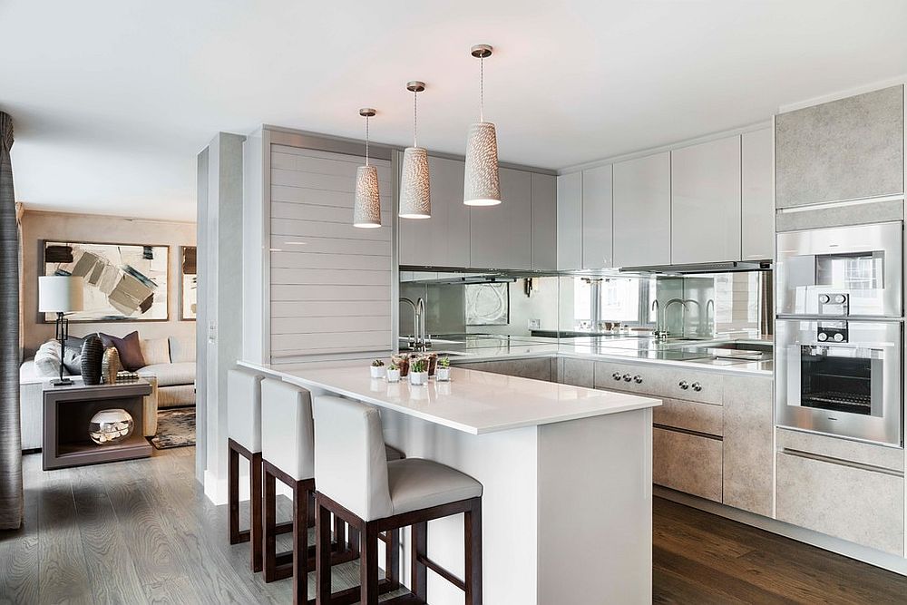 A mirrored backsplash for the contemporary kitchen in white