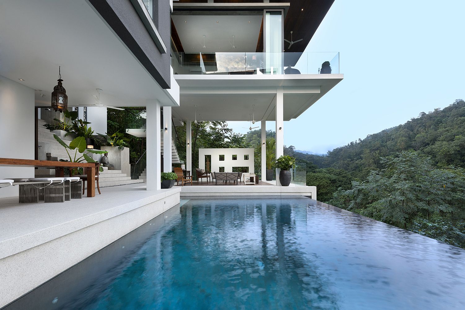 Asian style pool area with forest views is a showstopper