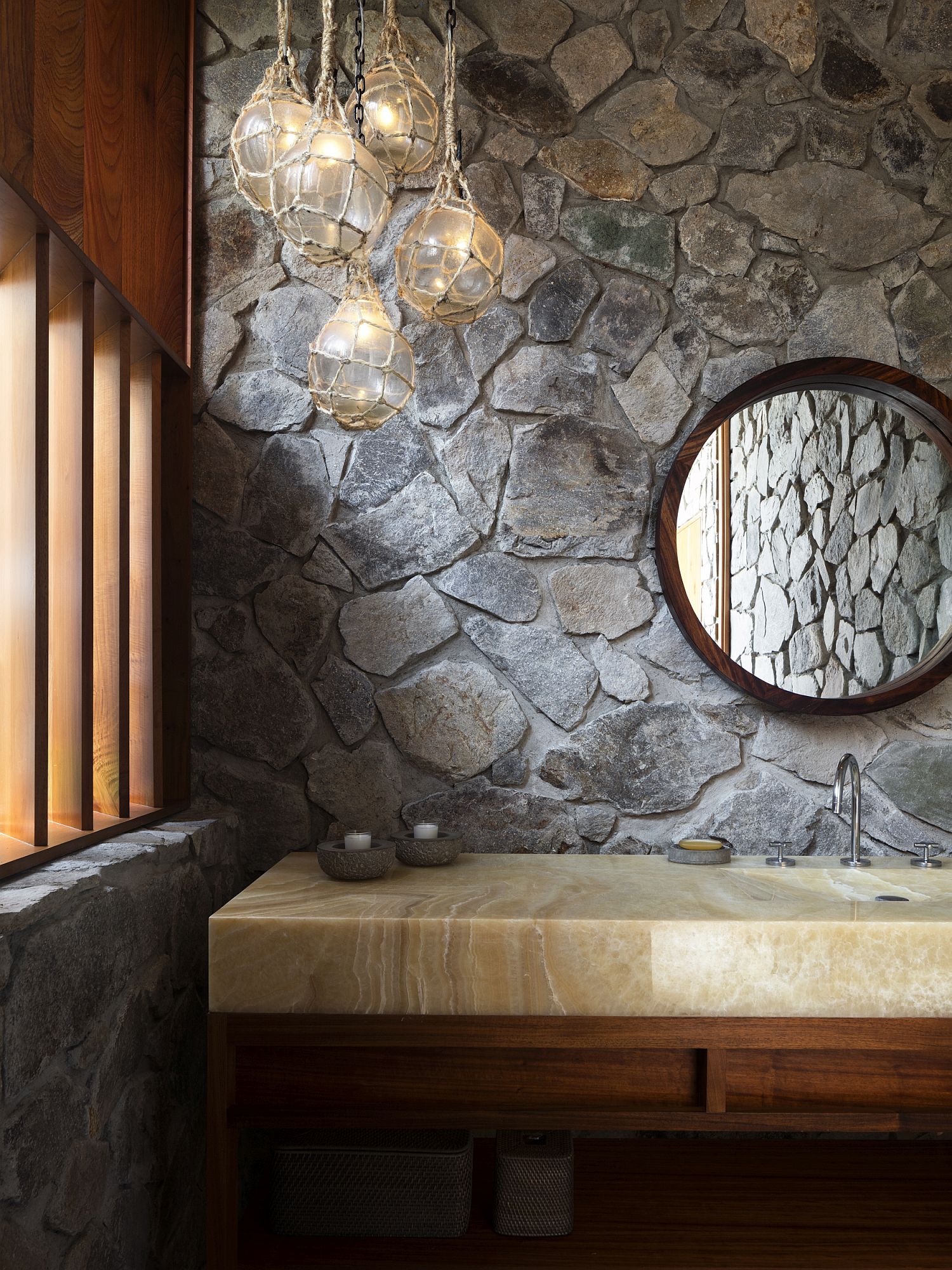 Bathroom in stone with wooden vanity