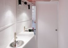 Bathroom-with-sliding-door-and-a-pink-ceiling-217x155