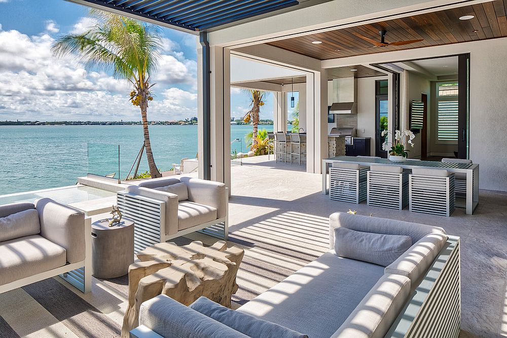 Beautiful beach style patio with blue ceiling protects it from the sun