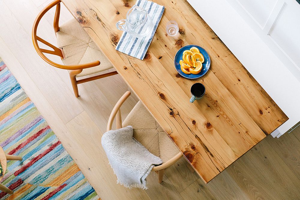 Beautiful dining space for two inside a stylish tiny home