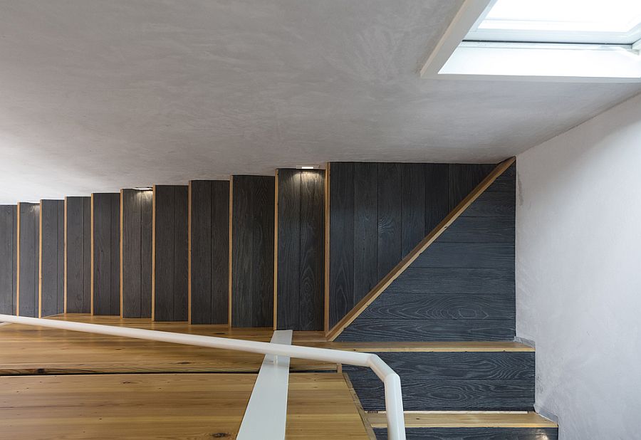 Charred wooden steps for the modern staircase