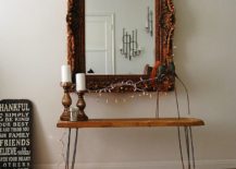 Creating-a-lovely-focal-point-in-the-eclectic-bedroom-with-mirror-and-string-lights-217x155