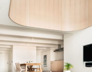 This Minimal Loft Inside a Converted Toronto Charm Has a Special Curved Surprise!