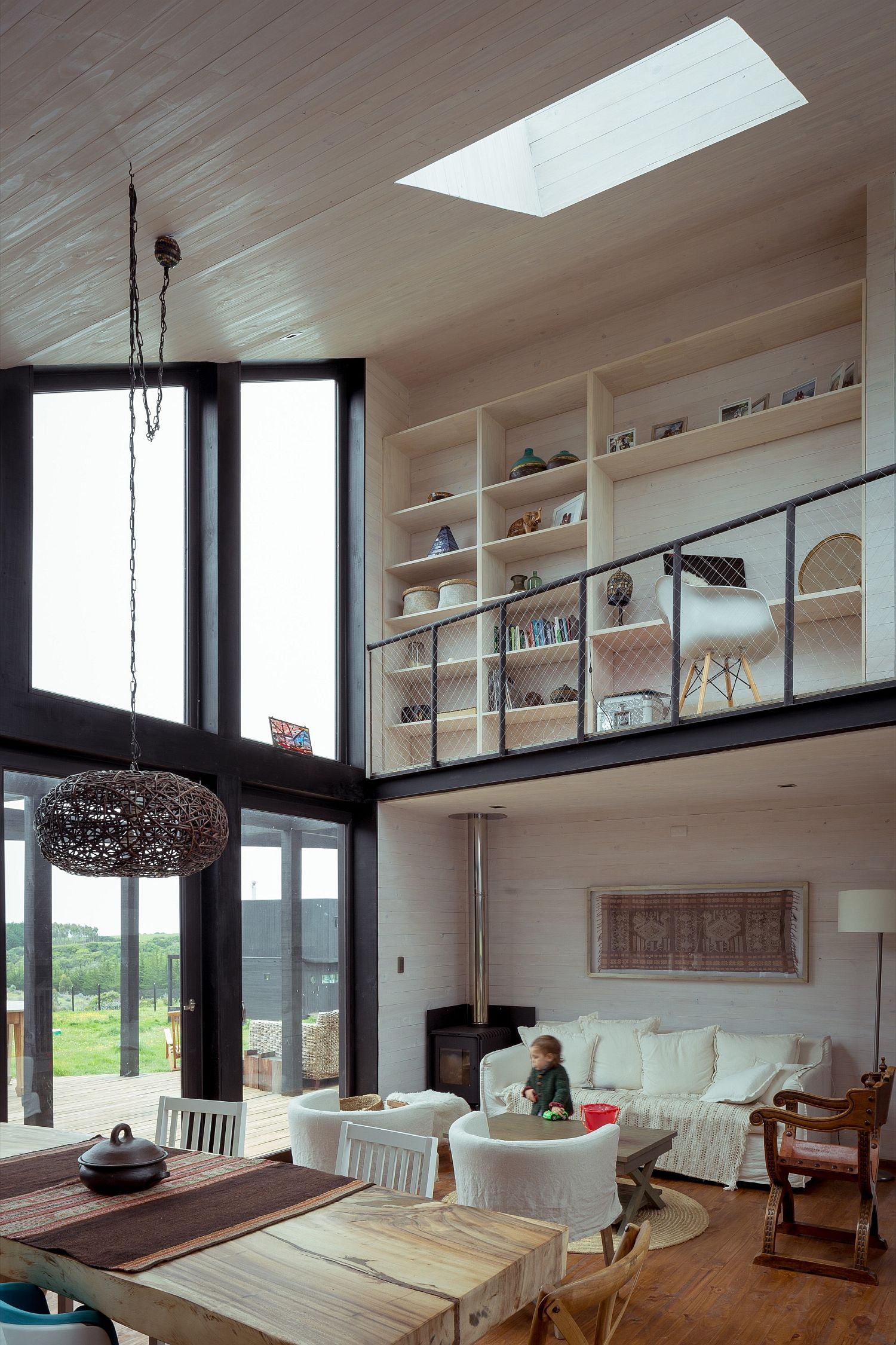 Double-height living area of the house with skylight