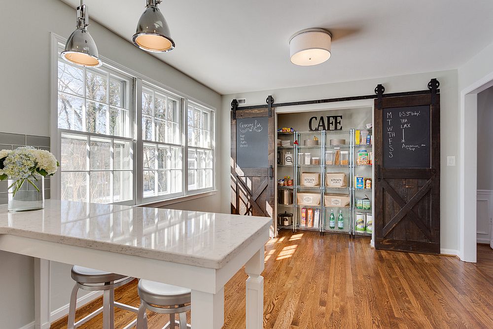 double sliding barn door pantry in wood and chalkboard