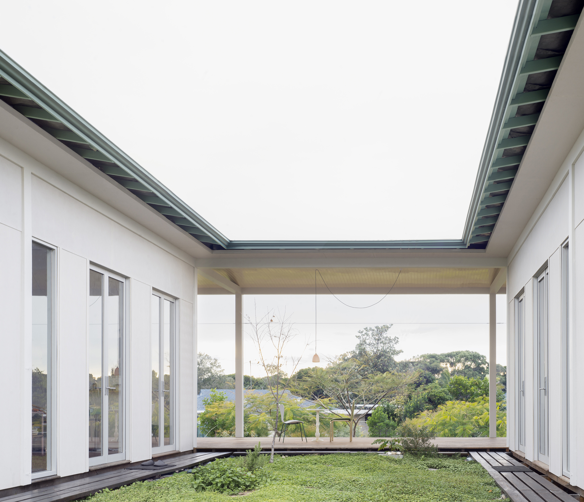 Framed views of the garden and the landscape beyond from the courtyard