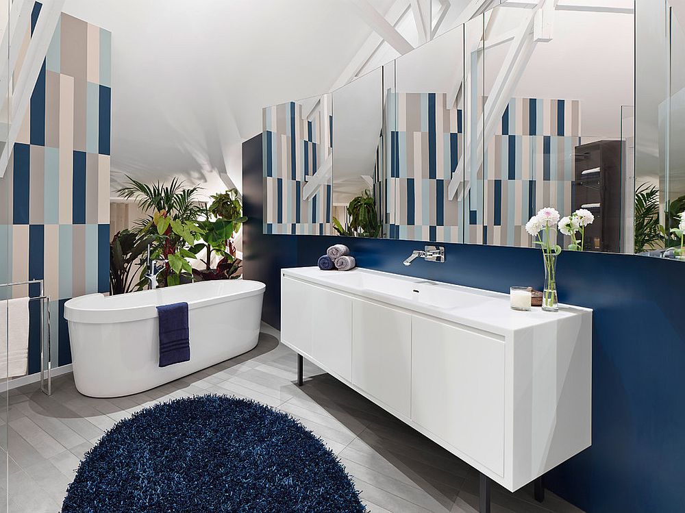 Fun way to add dark blue to the contemporary bathroom in white