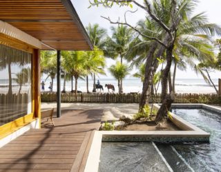 Sand and Surf Come Indoors at this Amazing Beach House on the Edge of Pacific