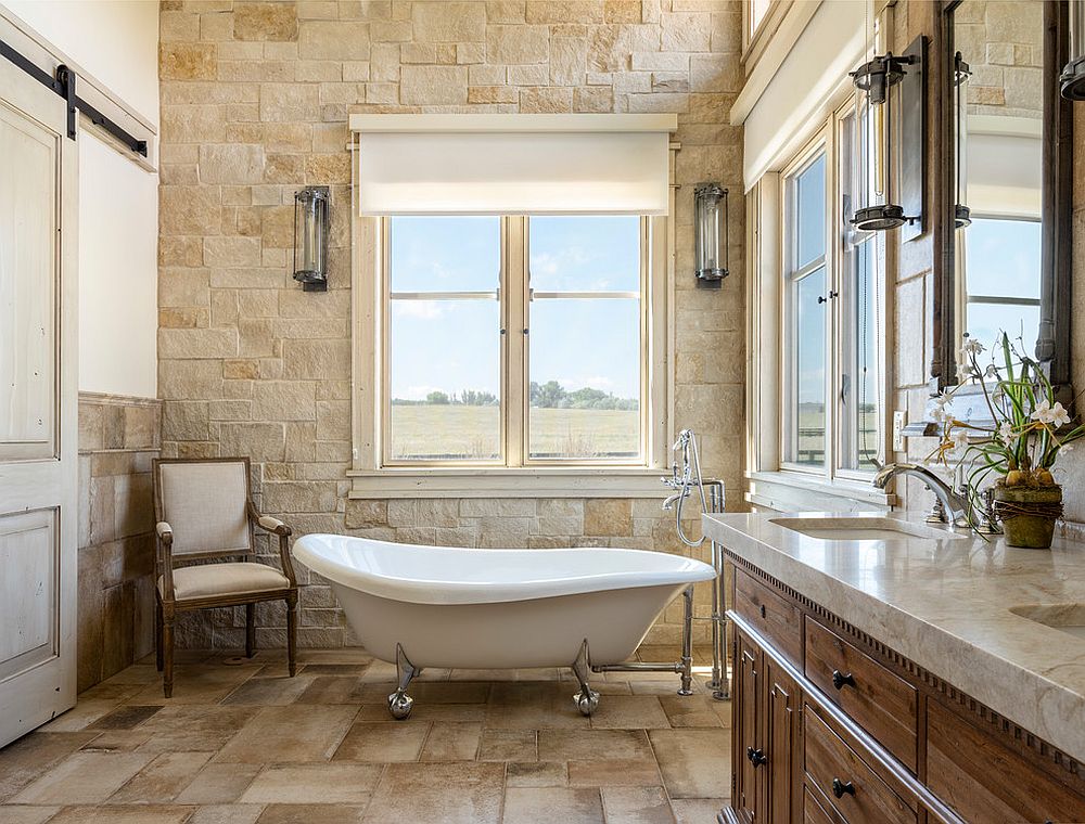 It is stone that brings beige to this farmhouse bathroom