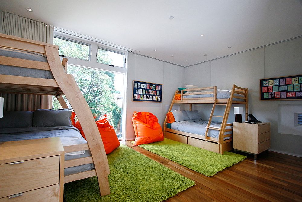 It is the rugs that bring greenery to this contemporary kids' room