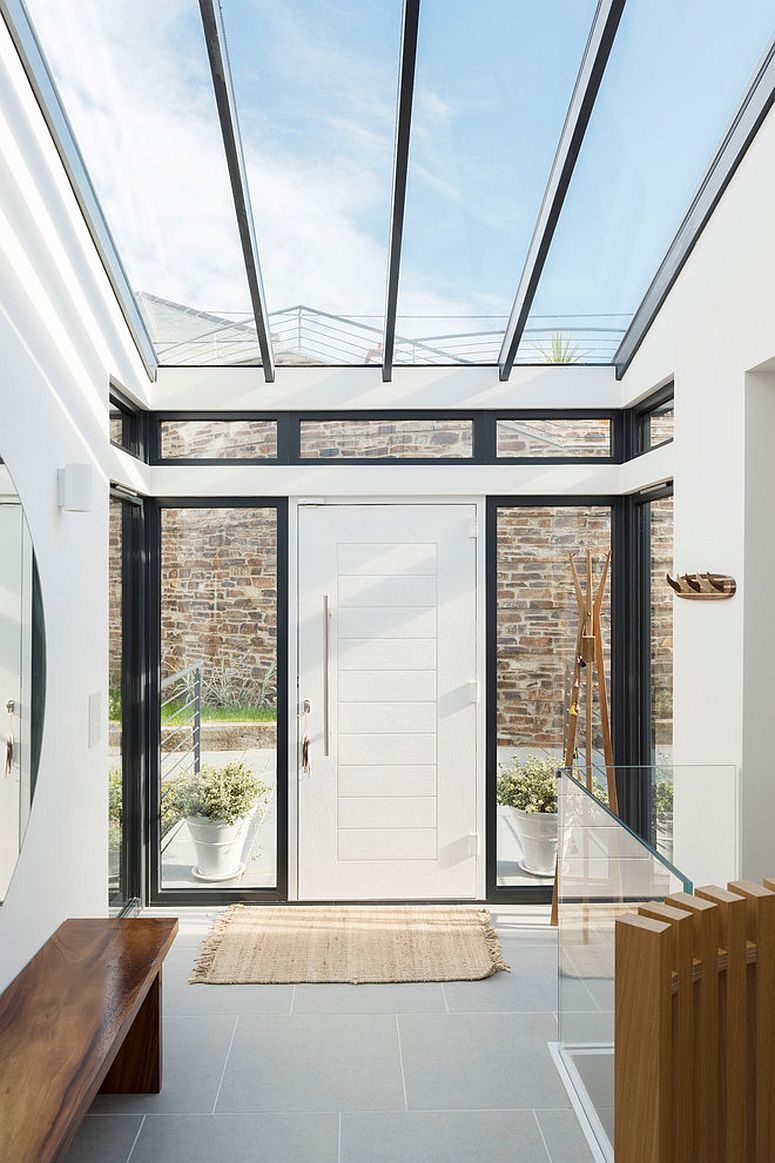 Large skylight connects the entry with the world outside