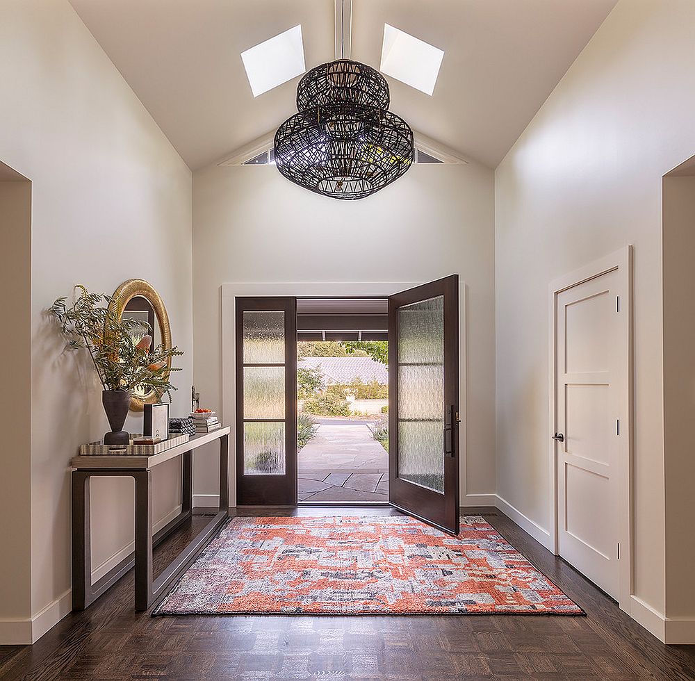 Lighting fixture grabs your attention here as much as the skylight