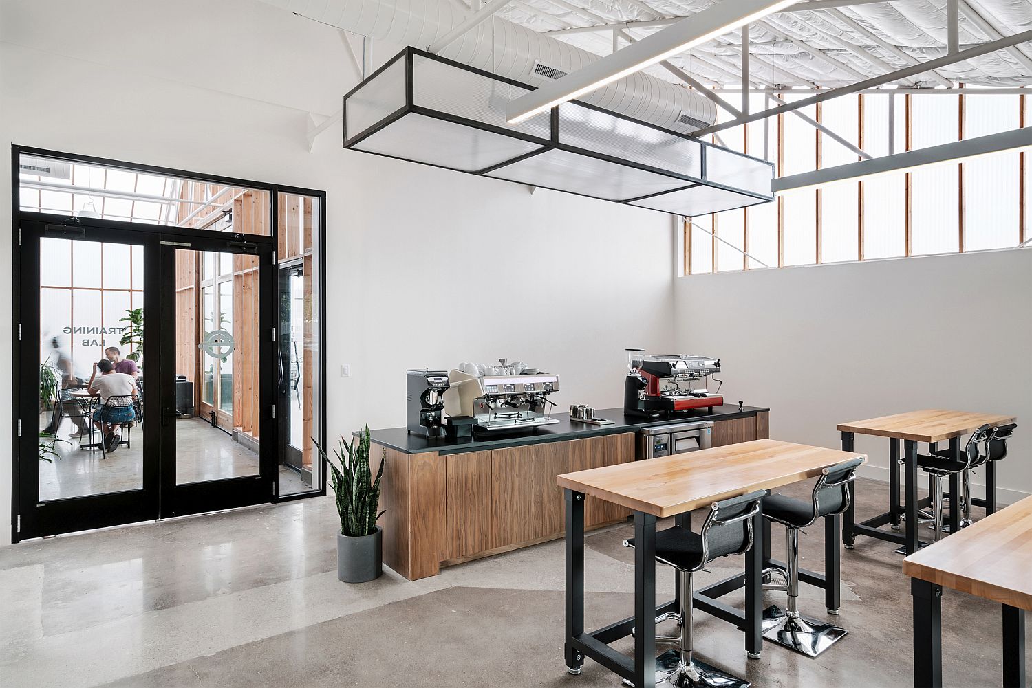 Look inside the modern cafe and roastery converted from old automobile building