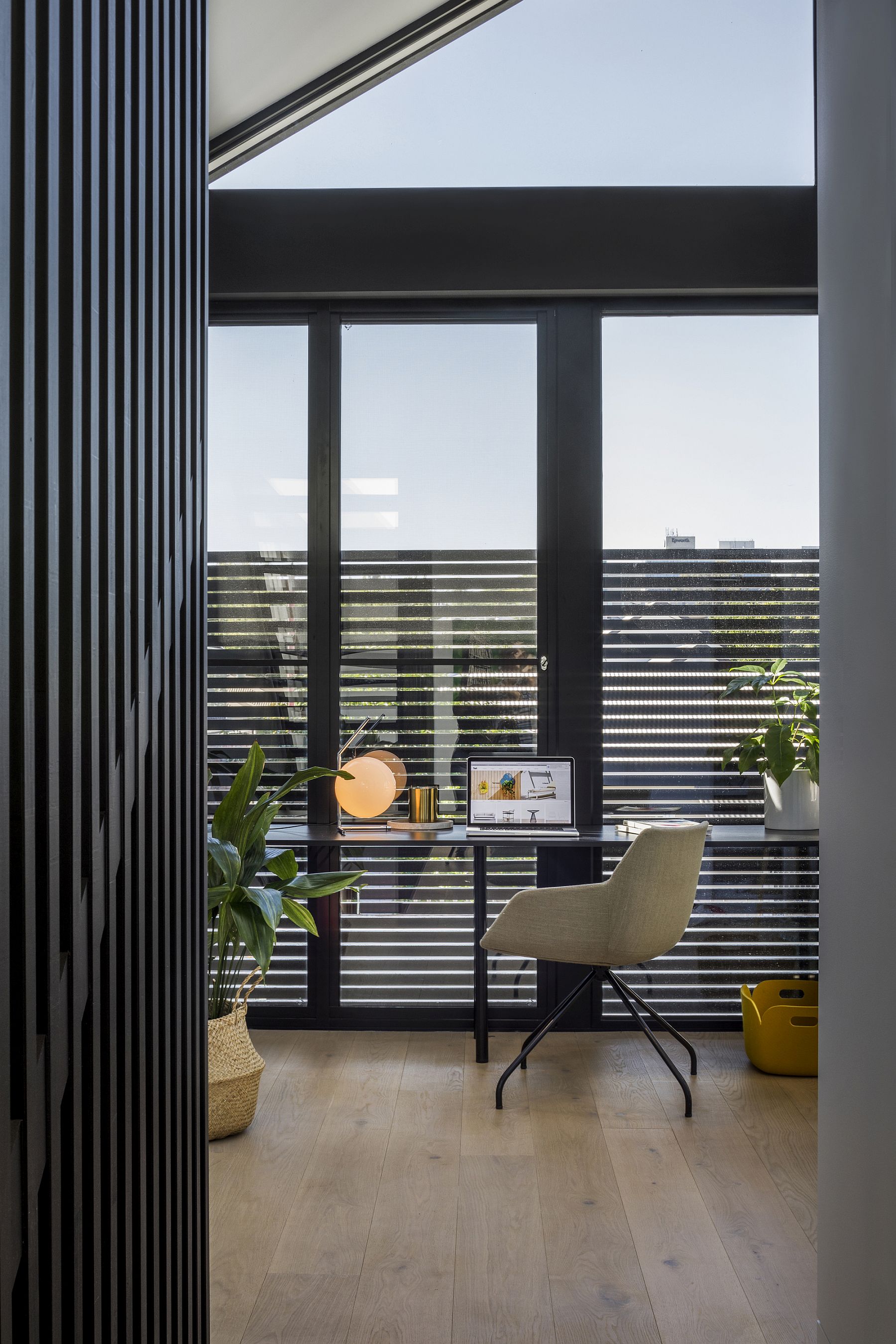 Minimal black and white interior of the T2 residence