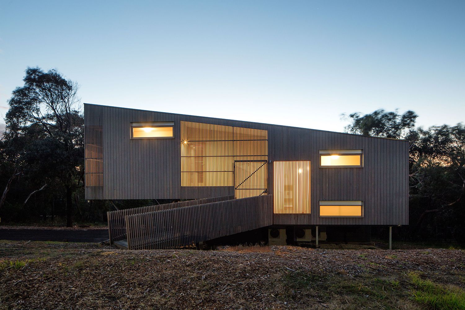 Modern home in bush fire prone landscape in Victoria, Australia