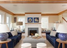 Navy-blue-sofa-with-white-piping-is-perfect-for-the-beach-style-living-room-217x155