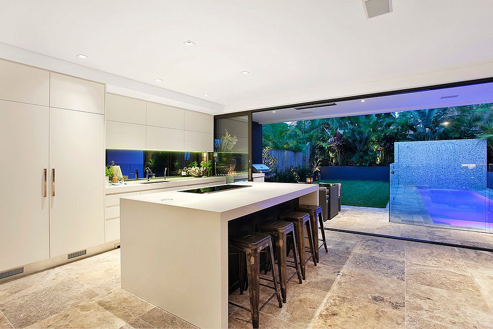 Polished reflective backsplash brings a dash of the outdoors inside