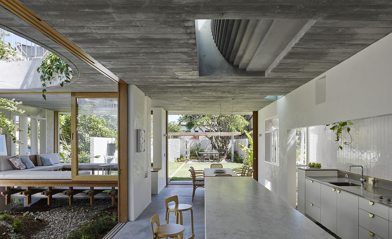 Series of concrete walls and smart extensions shape the new interior of the Gibbon Street