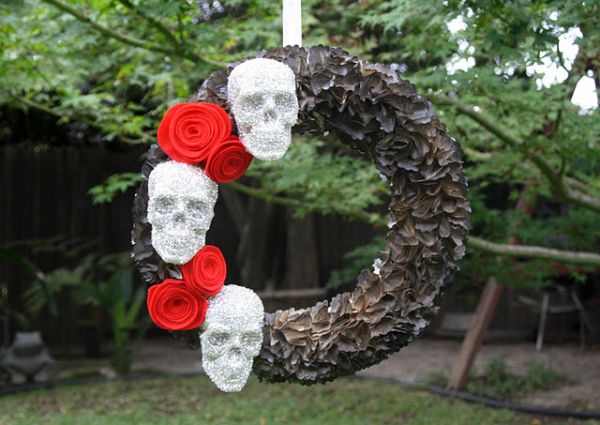 Skulls and sparkle shape this dark Halloween themed DIY wreath