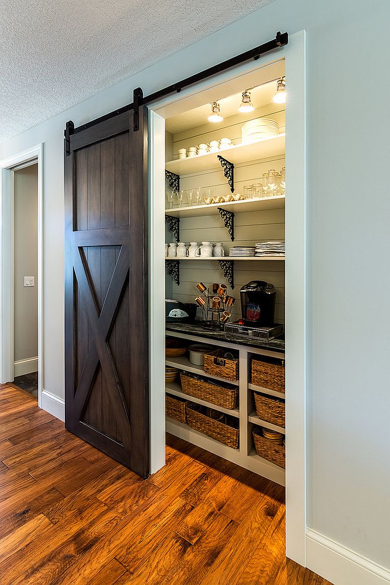 Sliding barn style door for the pantry is a great space-saver