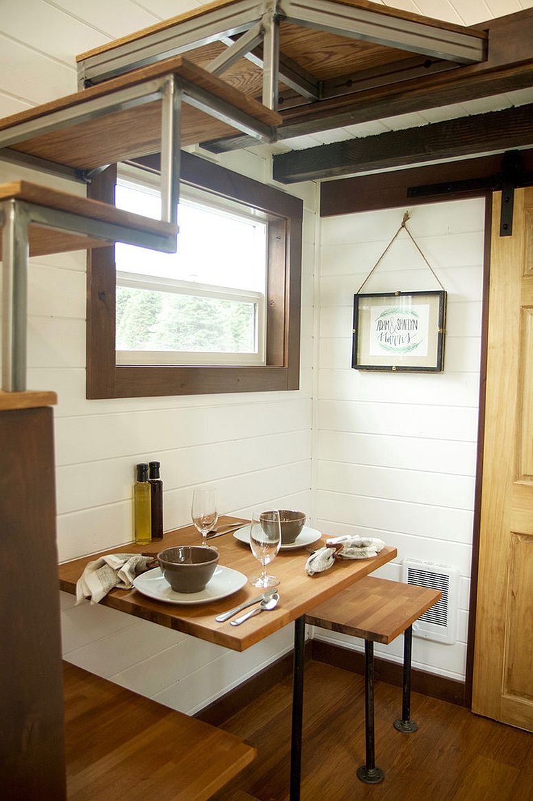 Space under teh stairway turned into a lovely little dining zone for two