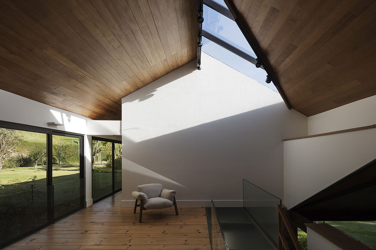 Spacious interior and skylights create a gorgeous upper level at the AS House