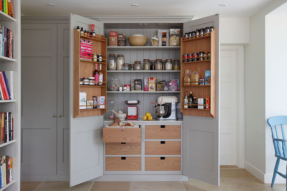 grey pantry double doors with organized cupboards