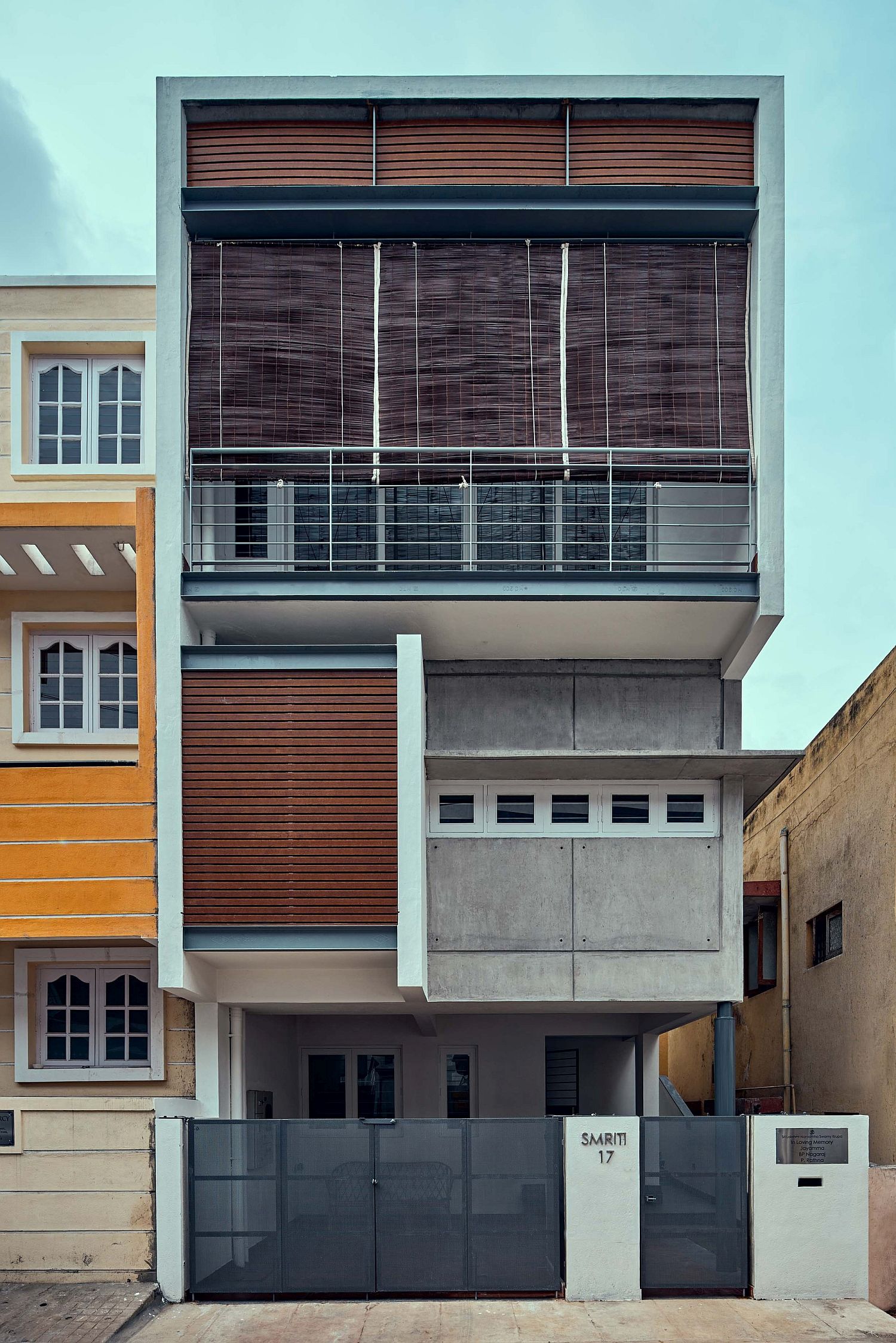 Street facade of House S with wooden slats