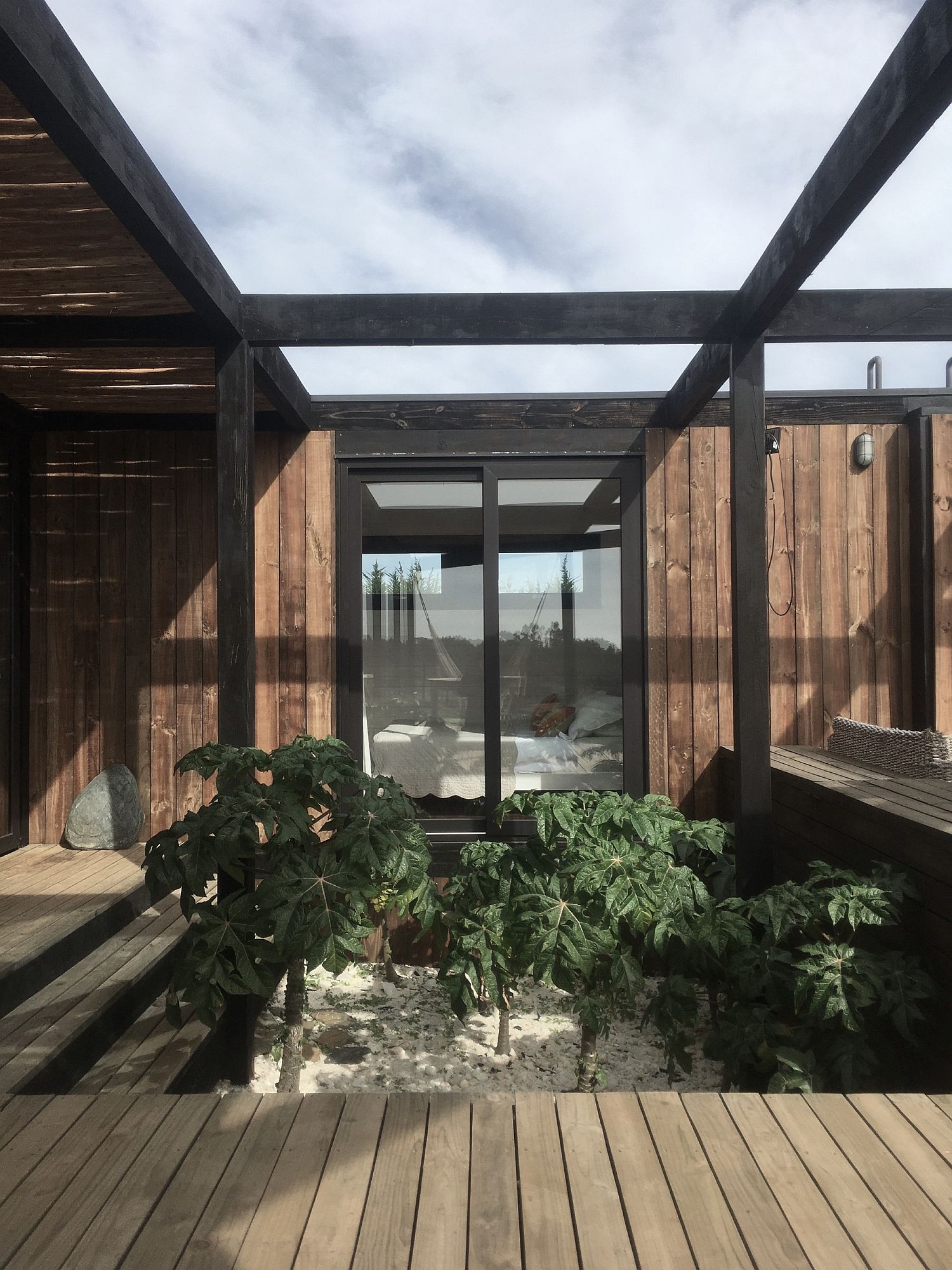 Structural beams and courtyard around the BL 1 House