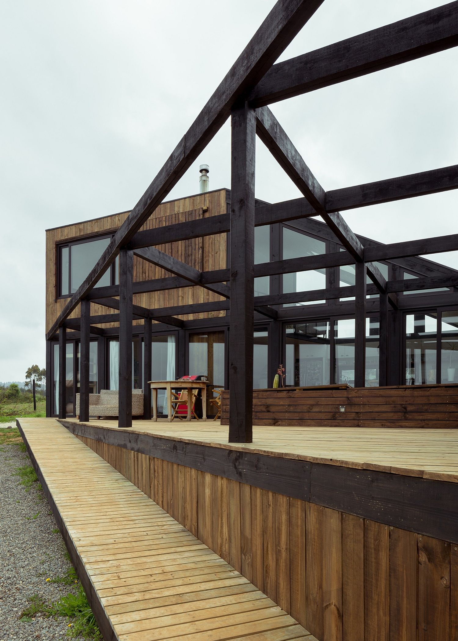 Stuctural metal beams create a support for the outdoor courtyard