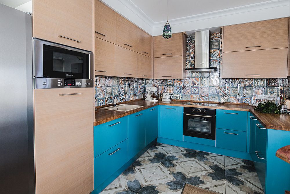 Tiles add both color and bold pattern to this kitchen in an eclectic fashion