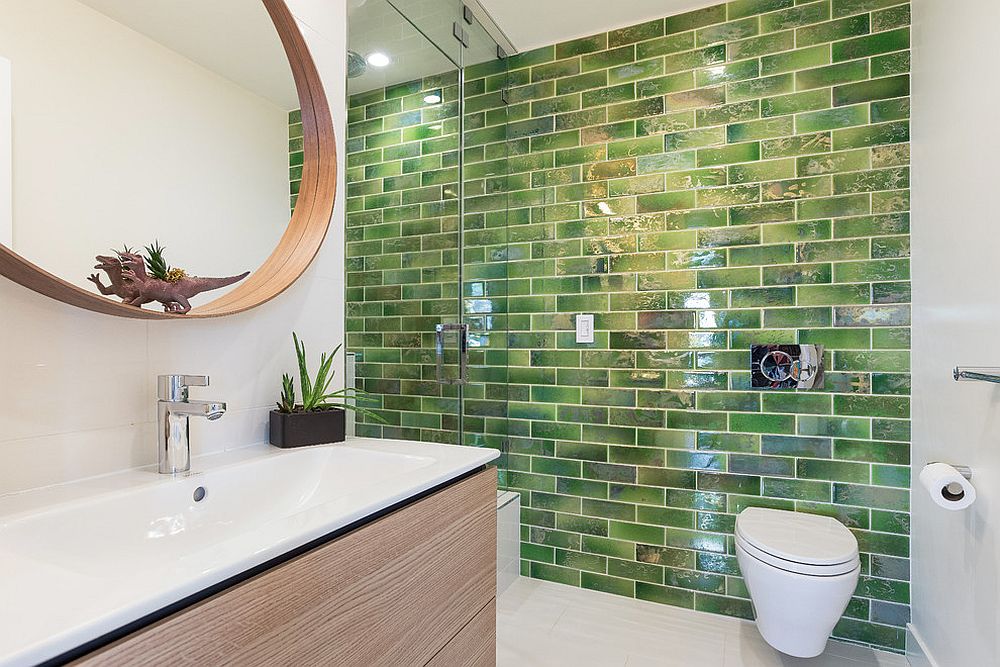 Tiles bring green to the bathroom in white and wood