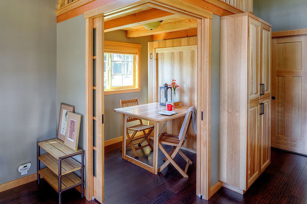 Tiny dining room for two with doors also promises privacy