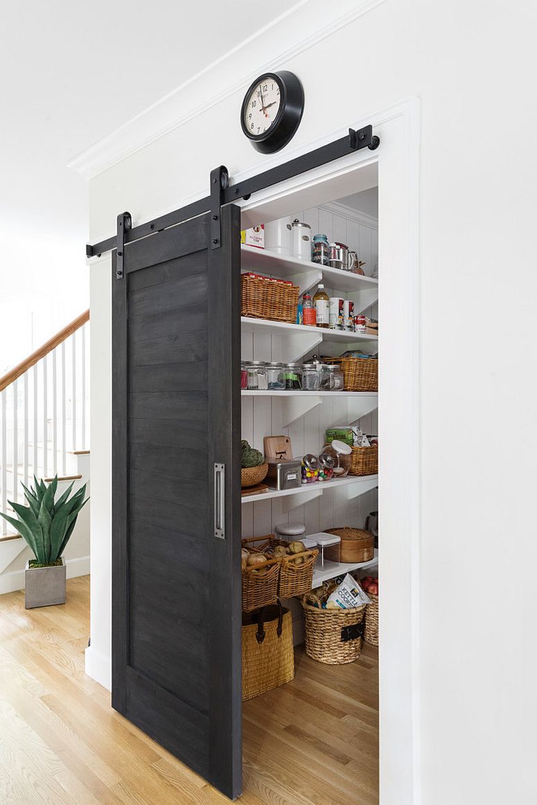 black wood sliding door with metal industrial bar