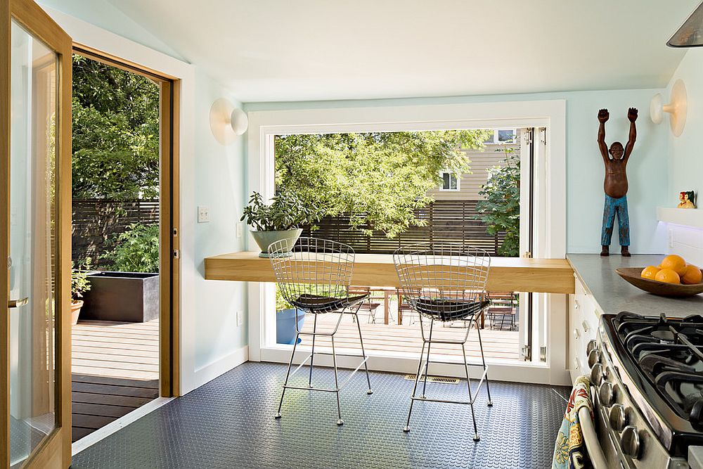 Turn the breakfast bar in the tiny kitchen into a table for two!