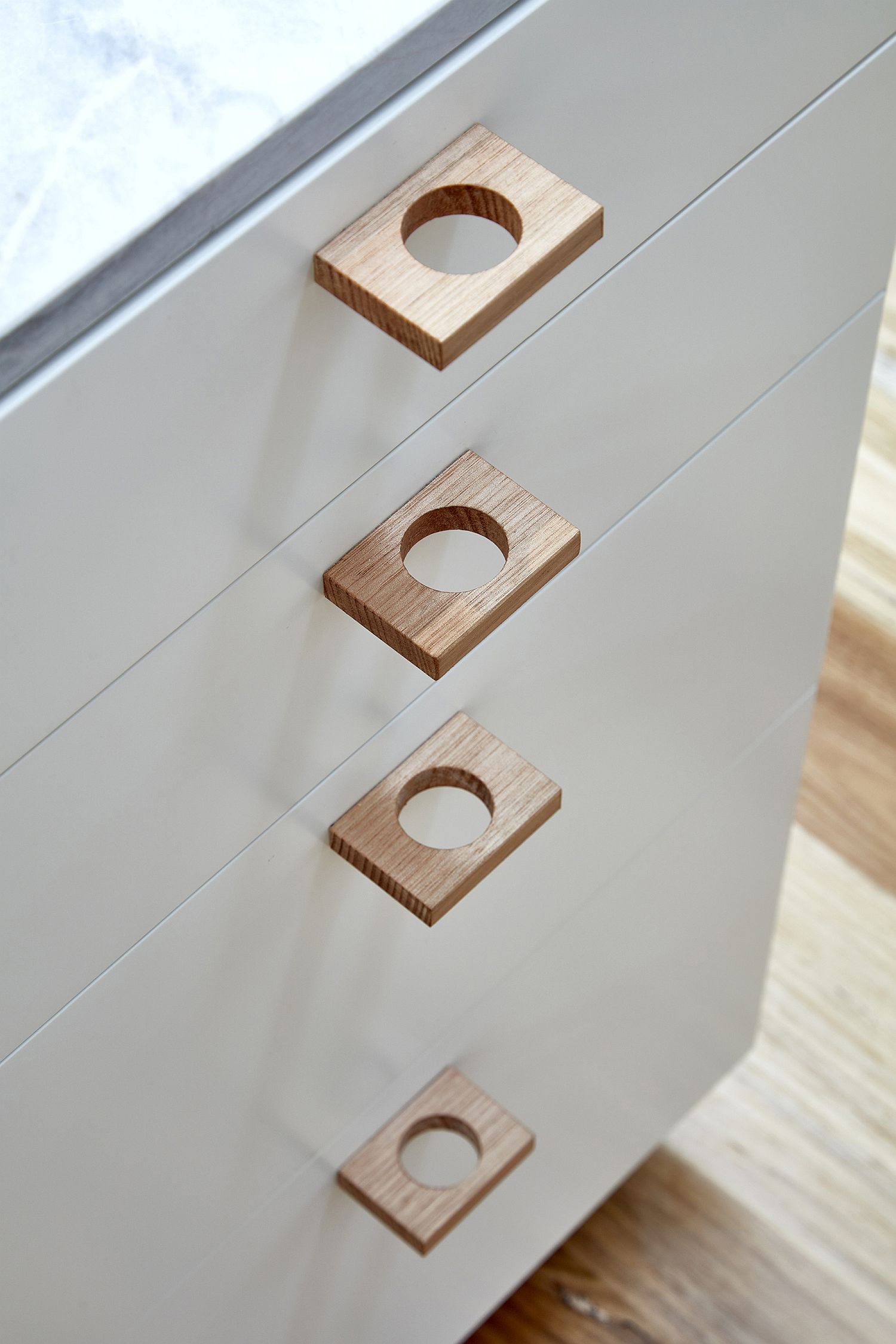 Unique wooden handles for the kitchen cabinet