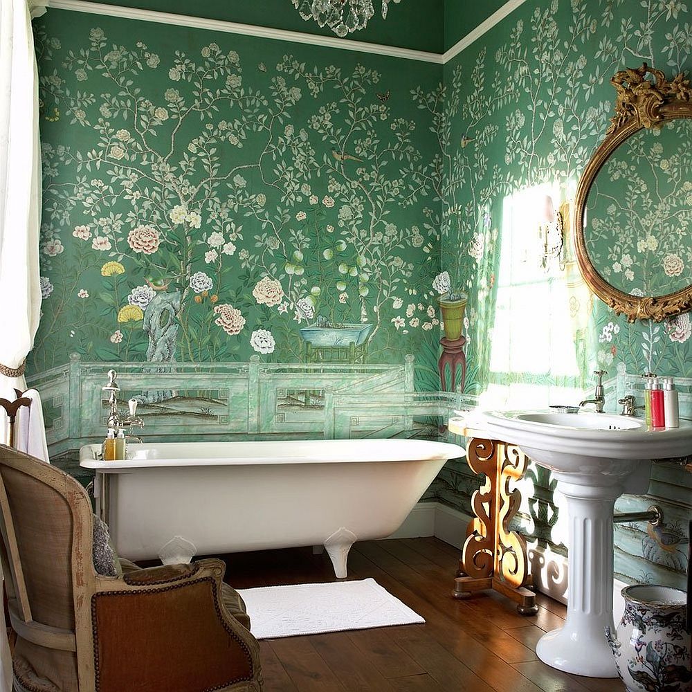 Victorian meets modern inside this dark green and lavish bathroom