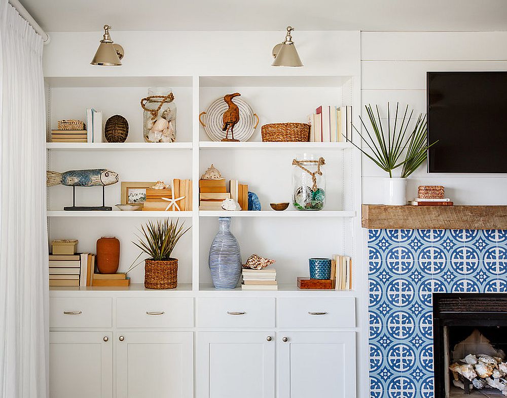 Beach style living room with Moroccan style tiles around the fireplace