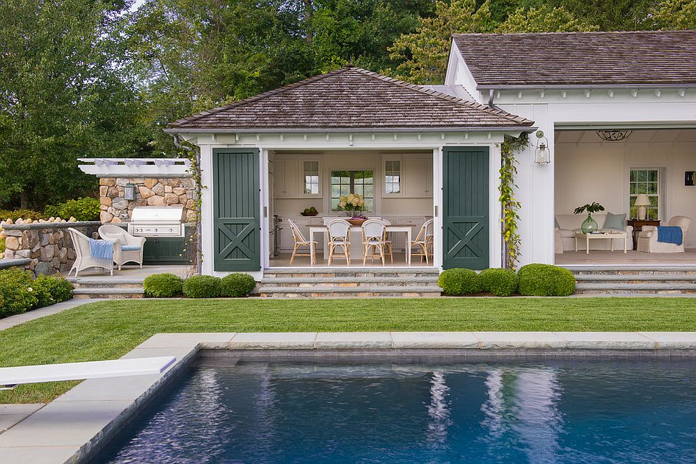 Beach style pool house feels like the perfect place to hold fall festivities