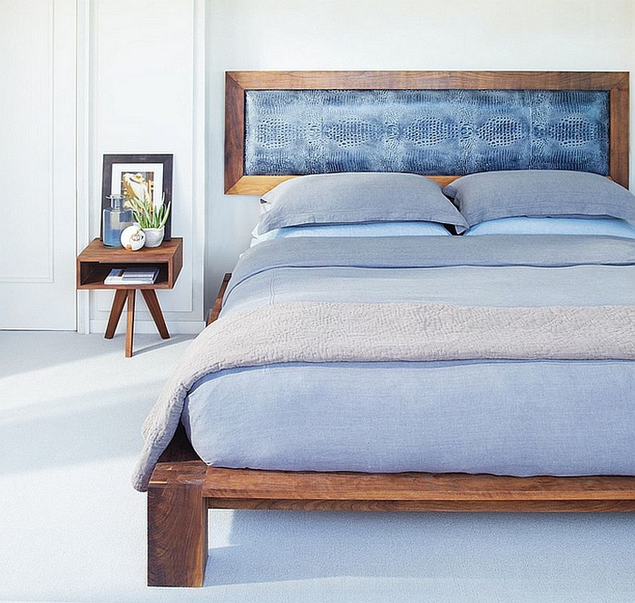 Bedframe and decor can bring wooden element into the white bedroom