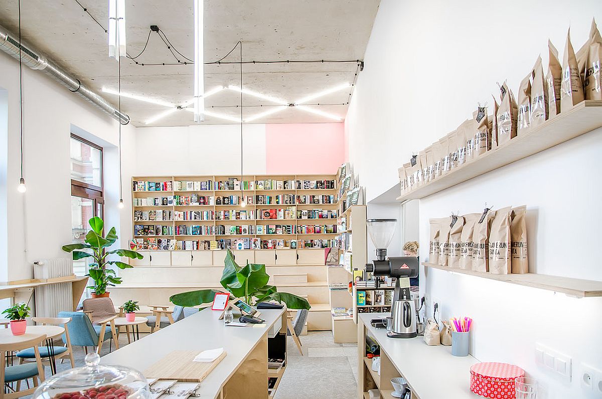 Bookstore section of the coffee shop with stadium seating at the back