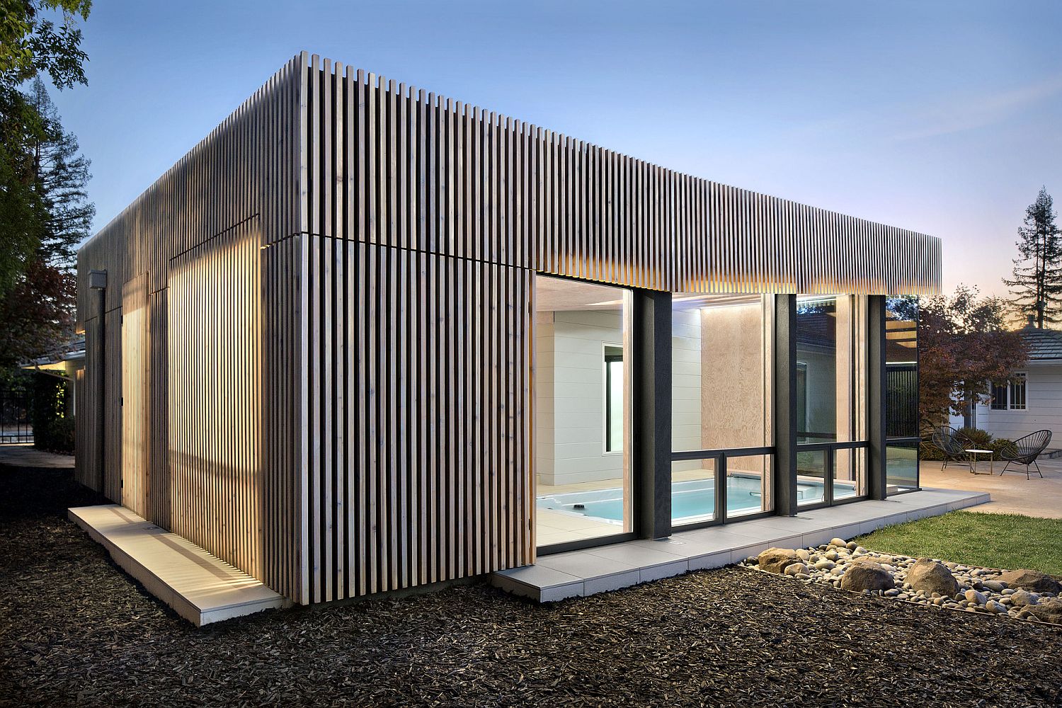 Cedar rainscreens and weathered cedar exterior of the pool house